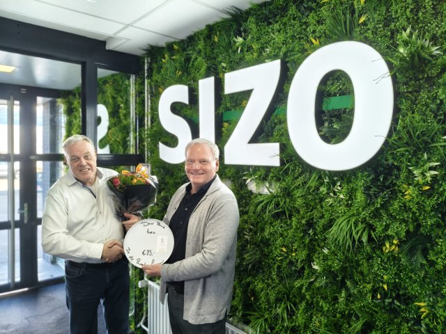George Moonen van SIZO met wethouder Eric Faassen