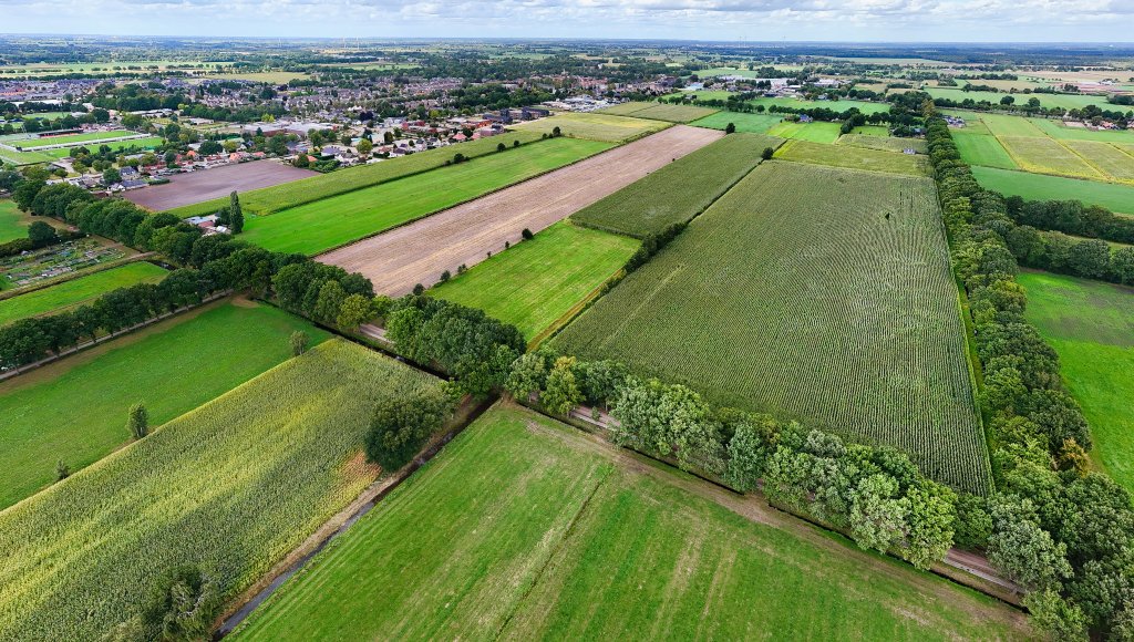 Op de foto staat het gebied Palthelanden vanuit de lucht gezien, dit zijn nu nog weilanden.