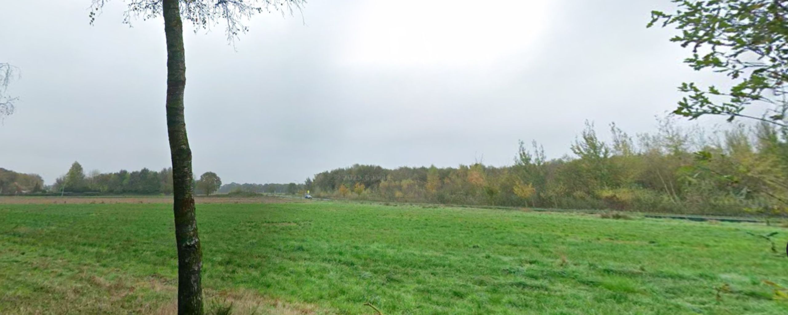 Google streetview van de gronden naast de locatie van het nieuwe zwembad.