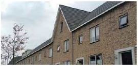 rijtjeshuis waarvan de middelste woning een verdraaiing van de kap heeft