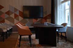 Table and chairs in the renovated wedding hall