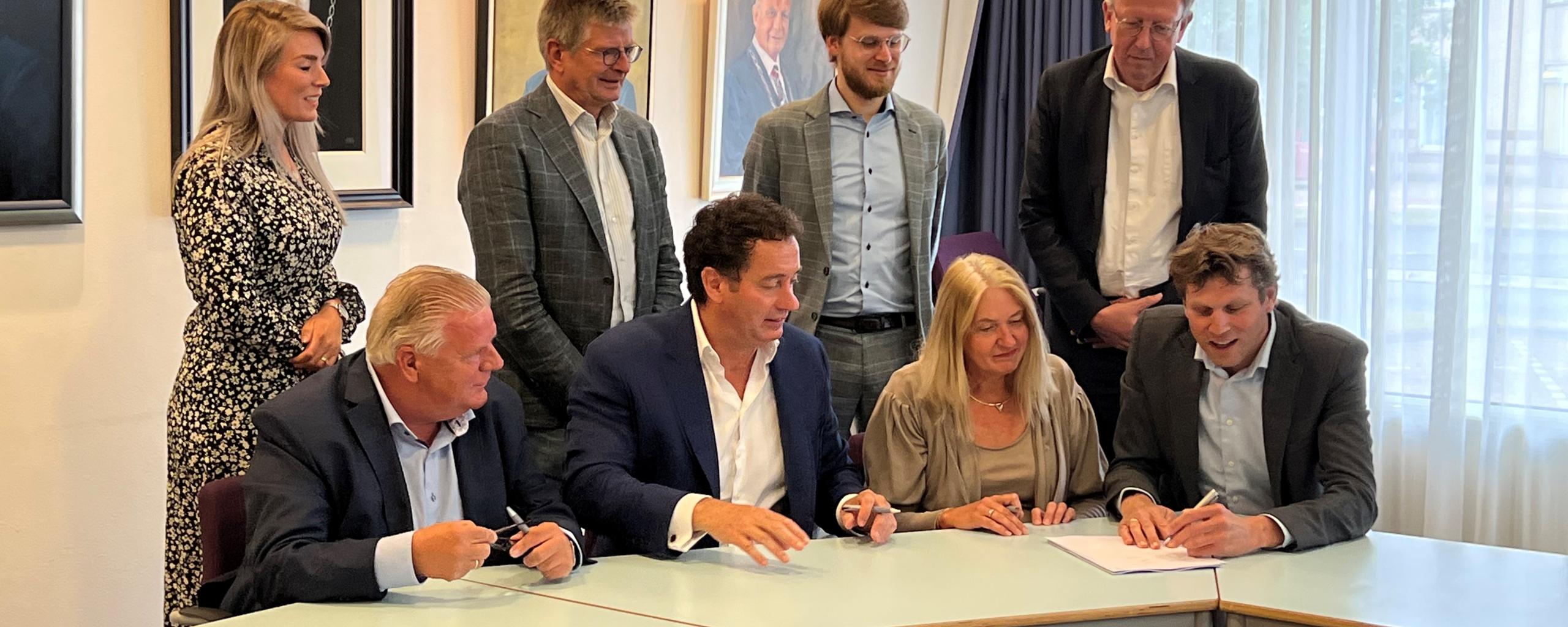 Moment van ondertekening van het concept collegeprogramma