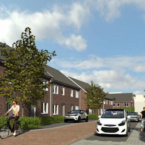 An impression of Centro Meta. A street with townhouses