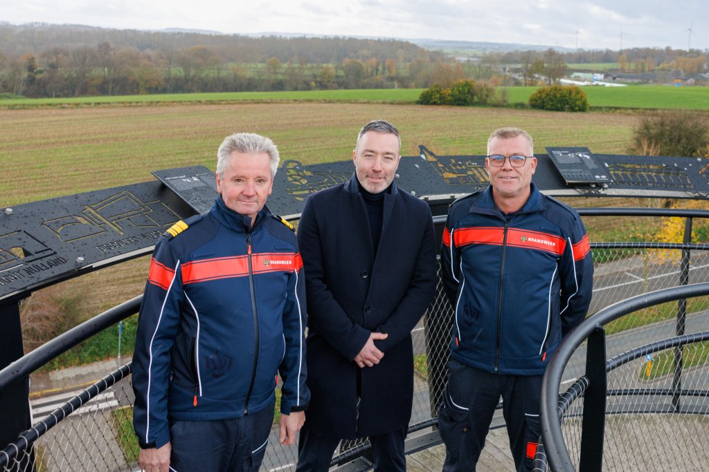 Director of Safety Region South Limburg and Commander of South Limburg Fire Department Léon Houben, Alderman Alexander Geers and firefighter Dennie Zafarin stand on the Tower of Gaia overlooking the site where the new fire station will be located