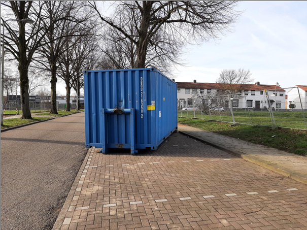 Een afbeelding van de papiercontainer in kwestie