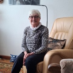 Mrs. Van den Berg in her living room.