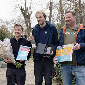 Foto van drie leden van Scouting Karel Doormangroep