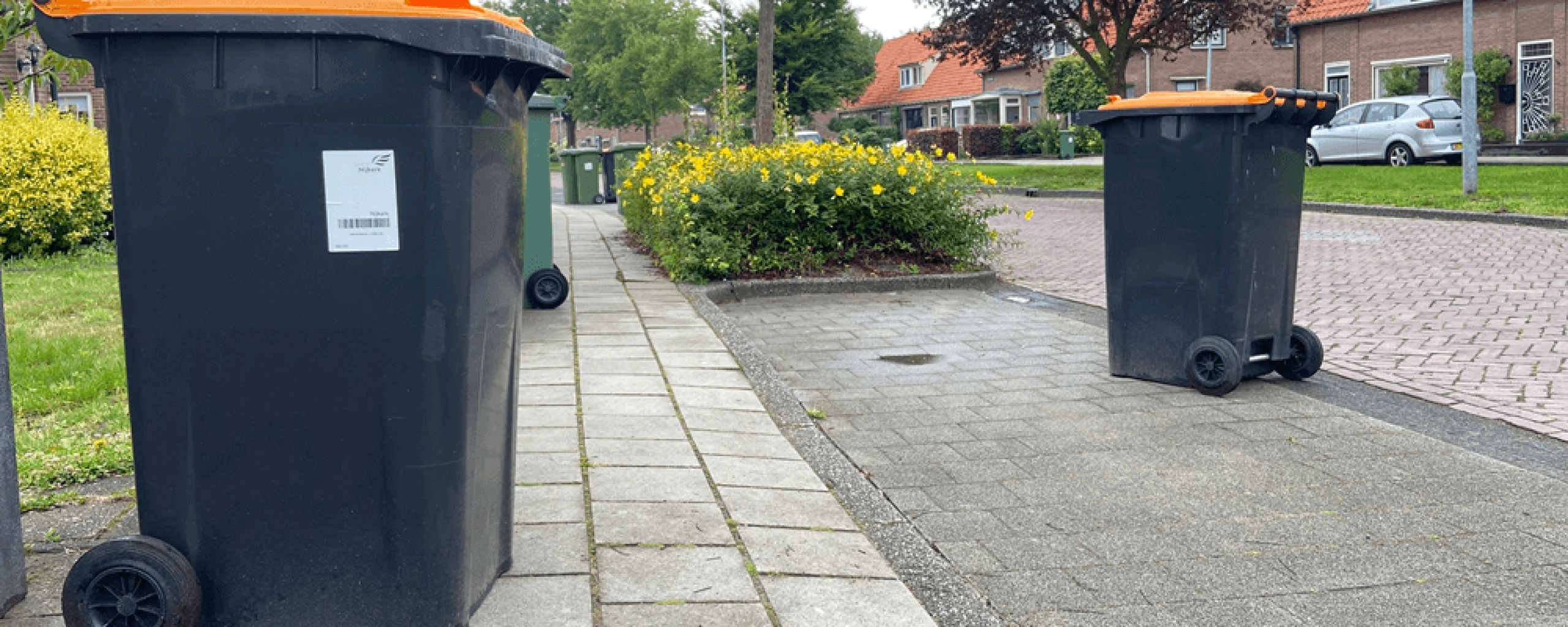 pmd afvalbakken op straat in Nijkerk
