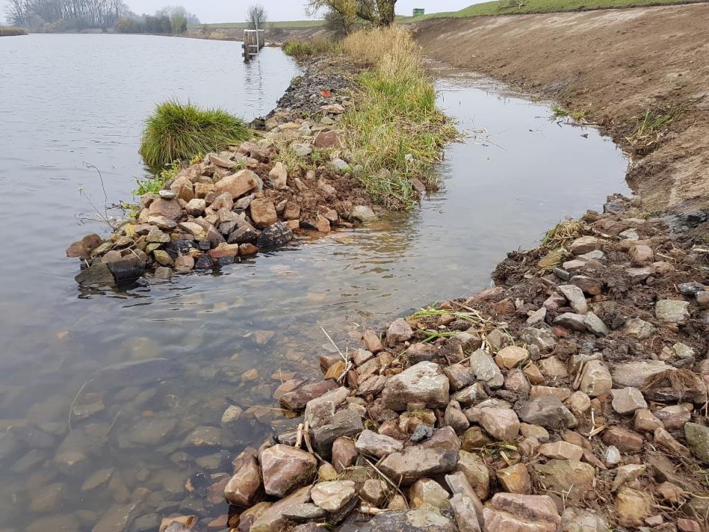 Doorgang in steenstort Reitdiep ten behoeve van creëren paaiplaats voor vissen.