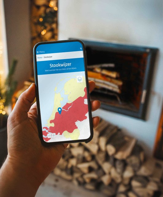 Stookwijzer te zien op een telefoon