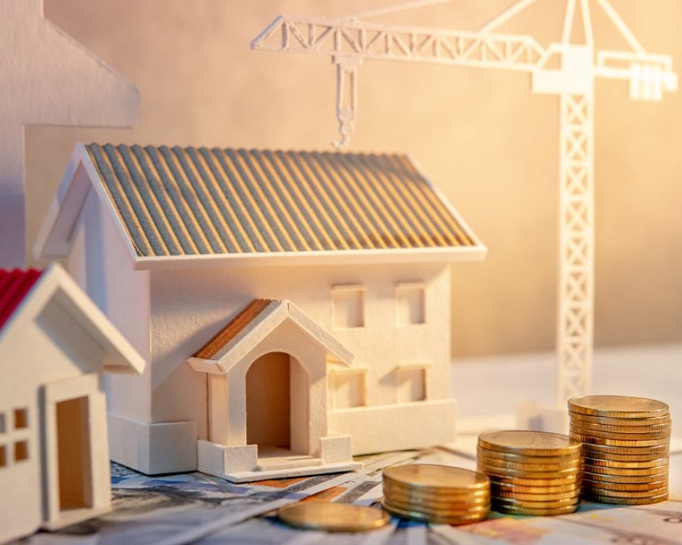 Foto huis met geld