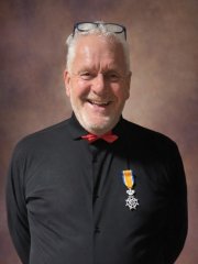 Portret van Dhr. J Bustin uit Posterholt – Lid in de Orde van Oranje Nassau.