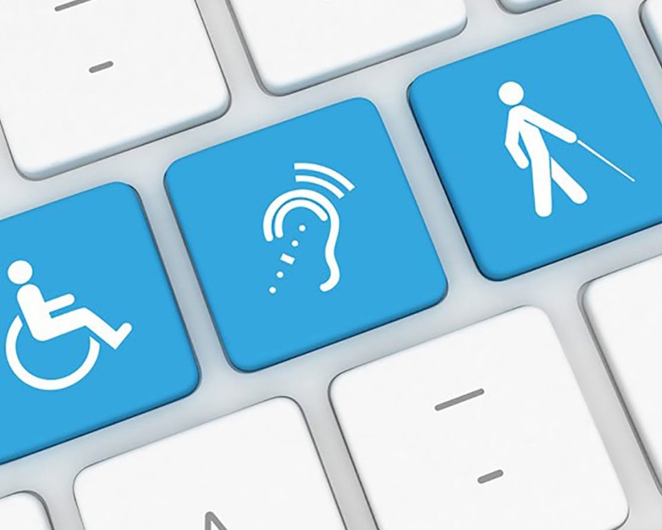 keyboard with 3 blue buttons with an icon of a wheelchair, a hearing aid and a puppet walking with a blind guide stick. 