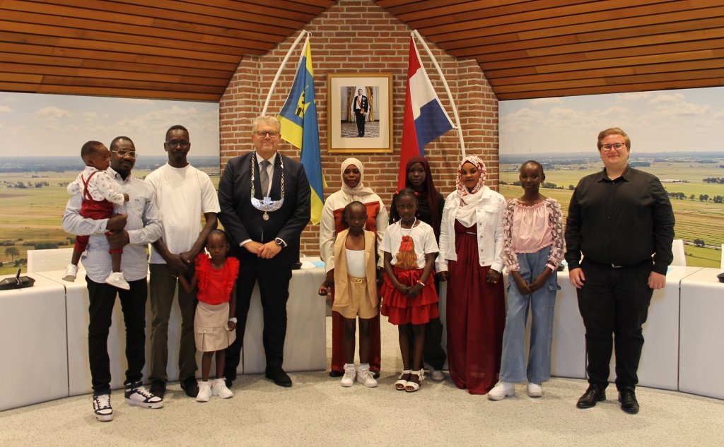 Groepsfoto samen met burgemeester Ten Kate