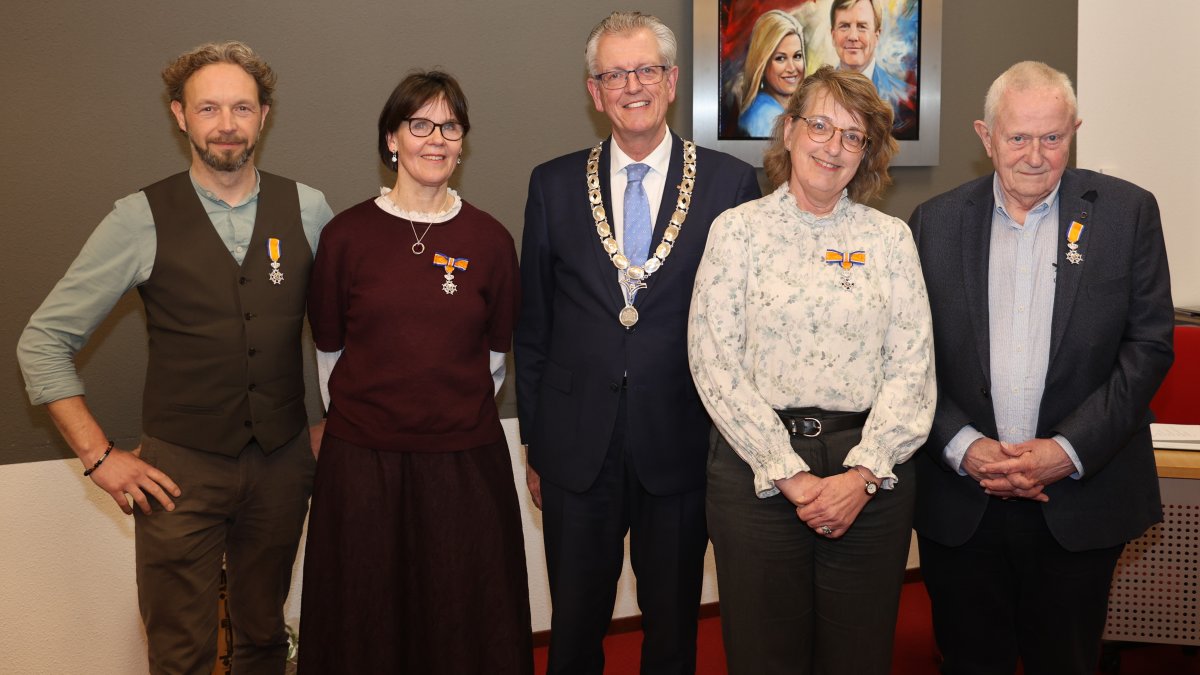Vier raadsleden koninklijk onderscheiden