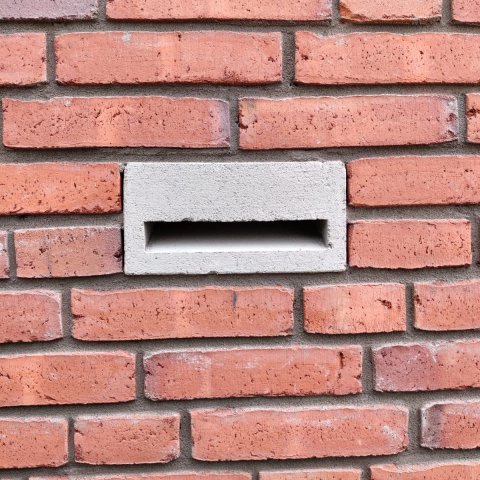 Spouwmuuropening: Open enkele stootvoegen voor toegang tot de spouwmuur