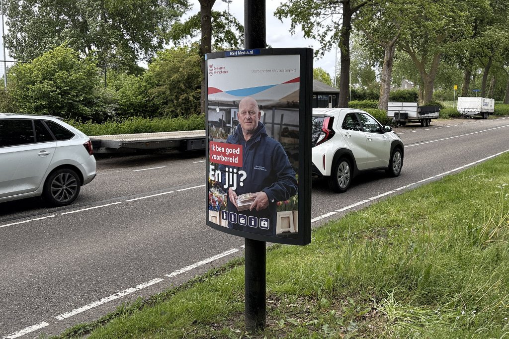 Poster langs de weg