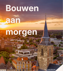 Luchtfoto van Winterswijk met de tekst 'Bouwen aan morgen'.