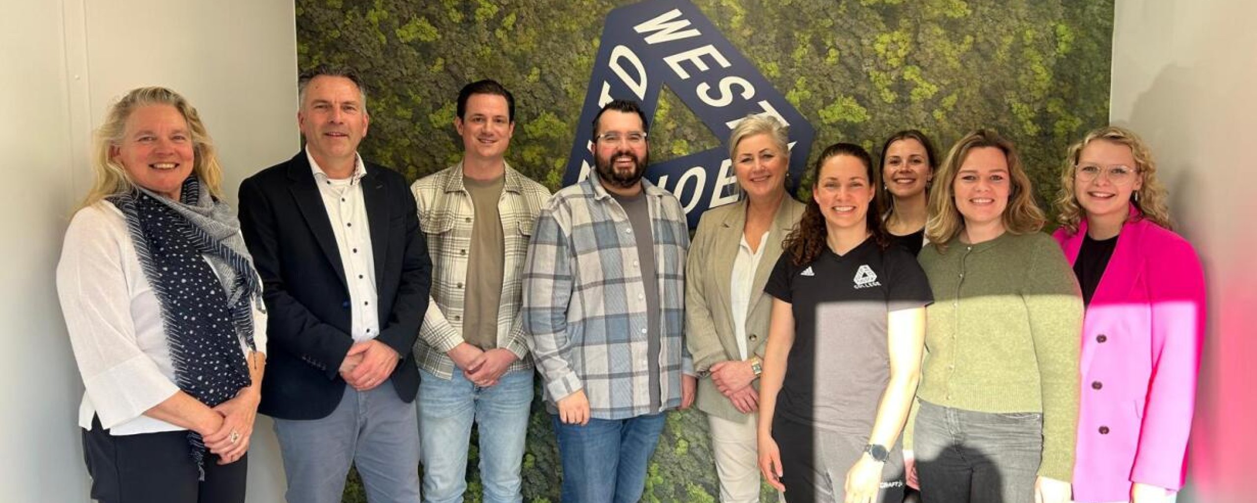 Foto van deelnemers aan het werkbezoek